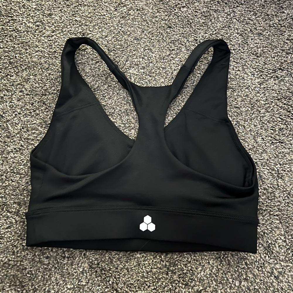 Sports bra, size extra small,and  never worn.